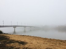 fog over a river and bridge 