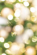 green and gold bokeh background 