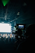 film crew filming a worship service 