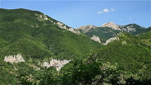 Romanian mountainscape with rocky ridges.