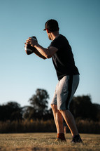 American Football, playing catch, recreational sports and ball games at the park