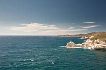 lighthouse along a shore in Korsika 