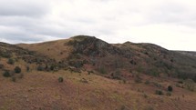 Hill with rock face, Push in