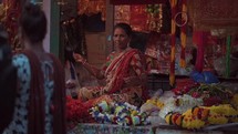 Merchants selling flowers outside the Hindu temple of Taraknath Temple in Kolkata, India.