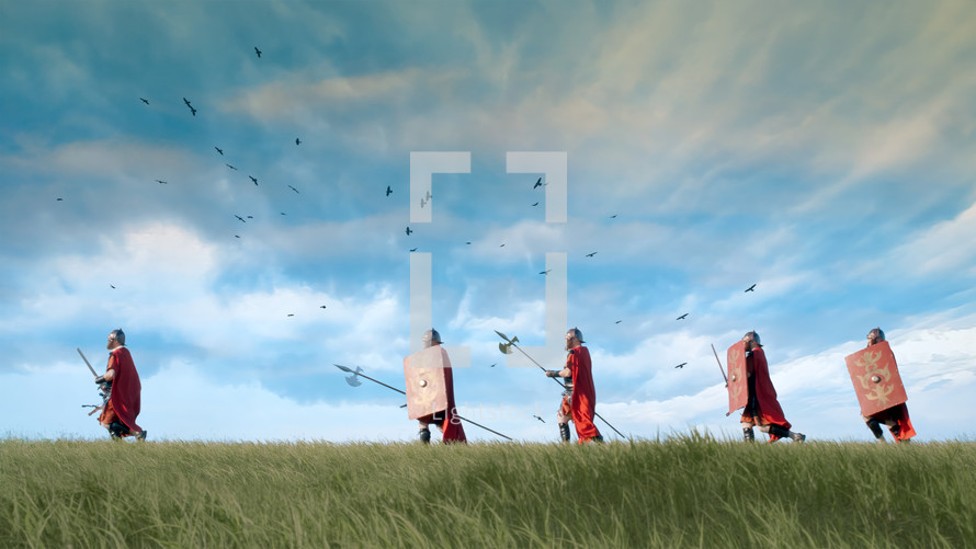 Roman soldiers and crows attack in a green field on a cloudy day.
