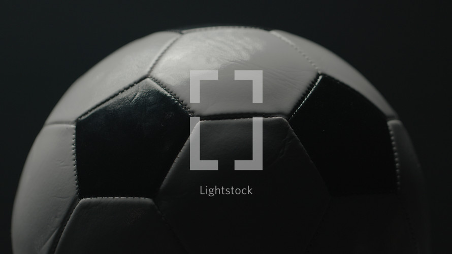 Dramatic, cinematic macro texture shots of a soccer ball