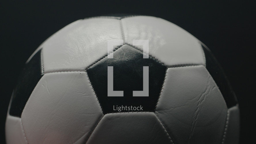 Dramatic, cinematic macro texture shots of a soccer ball