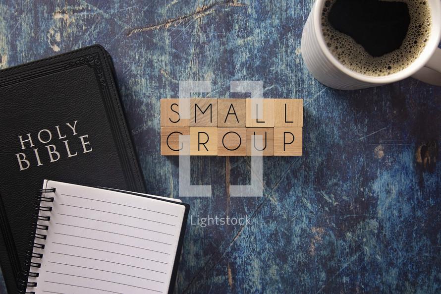 small group - Bible on a blue grunge background 