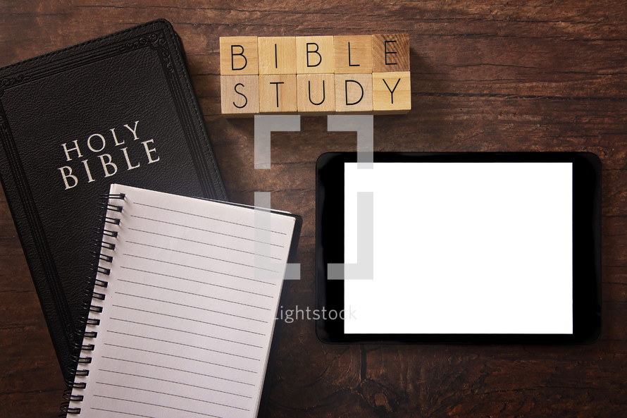 Bible and notebook on a wood background - Bible study 