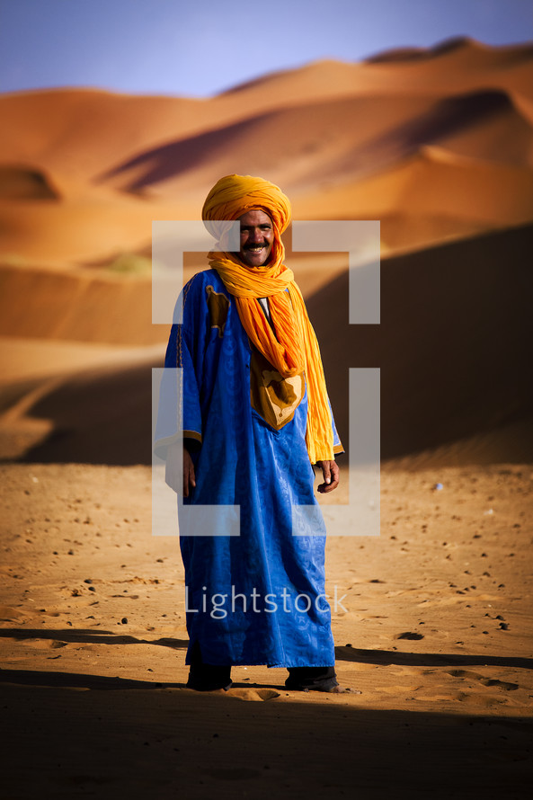man standing in the desert 