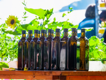 Sale of bottles of organic olive oil.