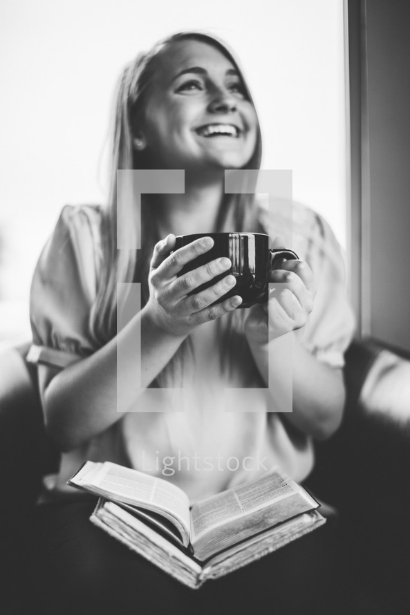 woman drinking coffee at a small group Bible study
