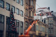 town putting up Christmas decorations 