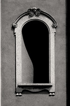 A window on a historical building in Italy