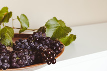 grapes on a teak tray 