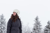teen girl in a coat outdoors in winter 
