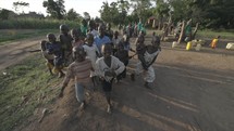 African Kids Chasing Camera Happy