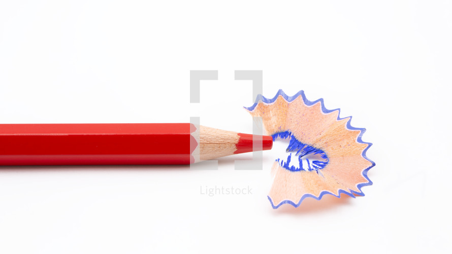 pen colored pencil and blue pencil shavings 