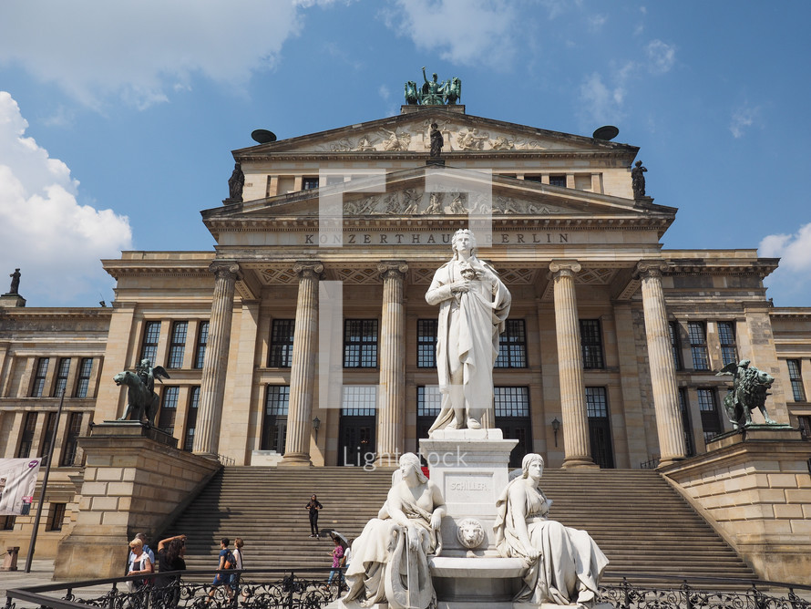 BERLIN, GERMANY - CIRCA JUNE 2016: Friedrich Schiller monument in front of Konzerthaus Berlin concert hall on the Gendarmenmarkt square in central Mitte district