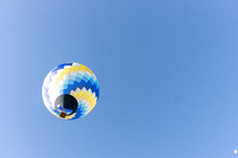 hot air balloon in a blue sky 