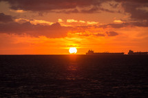 barge and sunset over the Pacific Ocean 
