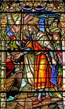 Jesus wearing a crown in a New Orleans stained glass window 