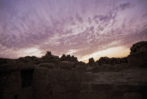 Clouds over stone structures in Israel