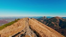 Timelapse, walking along the mountain ridge in the national park. Idyllic Carpathian nature in autumn on a sunny day