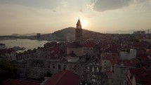 Sunset over Split, Croatia showcasing Saint Domnius Cathedral skyline - Aerial