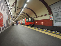 LONDON, UK - SEPTEMBER 29, 2015: Tube train at platform at Chalk Farm station on the Northern Line