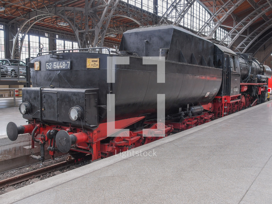 LEIPZIG, GERMANY - JUNE 12, 2014: Class 52 steam locomotive 52 5448 7 of the Deutsche Reichsbahn at Leipzig Hbf station