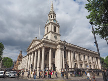 LONDON, UK - JUNE 09, 2015: Tourists in front of the Church of Saint Martin in the Fields in Trafalgar Square
