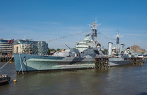 LONDON, UK - JUNE 11, 2015: HMS Belfast ship originally a Royal Navy light cruiser is now permanently moored on the River Thames as a museum ship