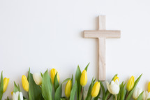 Cross and border of yellow and white tulips on a white background