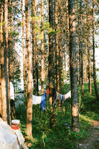clothes drying on a clothesline in a forest 