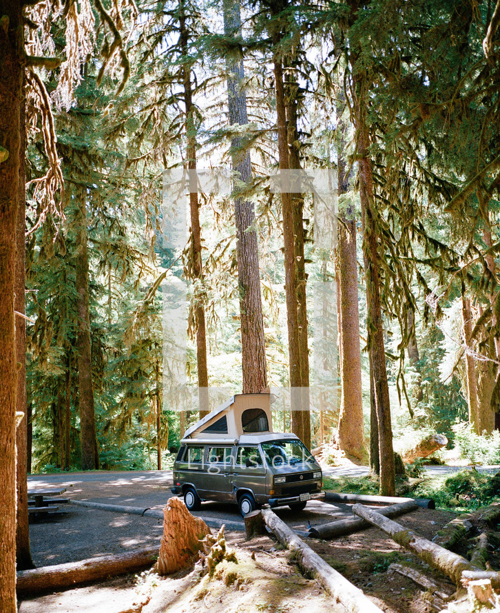 camper in a forest 