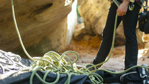 rope around a rock climber 