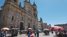 Historic Primatial Cathedral, tilt down to Plaza de Bolívar. Bogotá Colombia