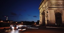 Time lapse of the Paris Arch de Triomphe at night