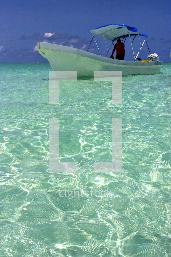 boat on turquoise waters 