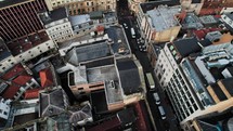 drone flying over european city streets europe aerial buildings and street