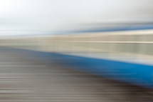 Blue Train Carriage Speeding Past