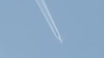 A jumbo jet crossing the sky in slow motion