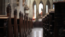 row of pews in a cathedral 