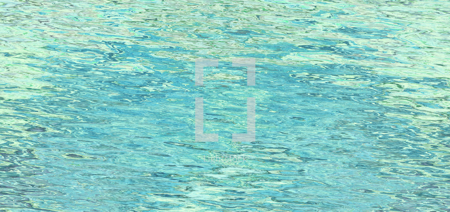turquoise and blue green rippling water surface