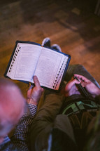 reading at a Bible study 