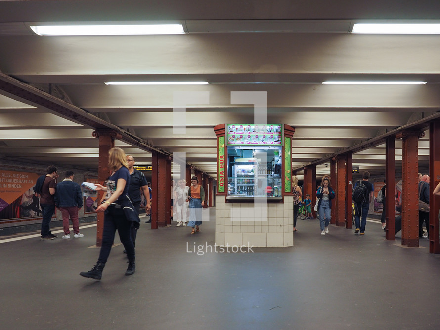 BERLIN, GERMANY - CIRCA JUNE 2019: People in Alexanderplatz underground station