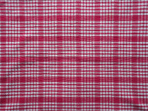 chequered red and white fabric texture useful as a background