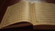 pages of an old hymnal 