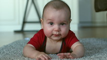 Infant crawling toward camera-isolated